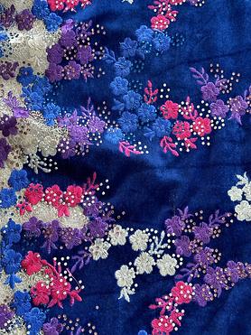 Webbed tulle, with royal velvet and fuschia and purple embroidery